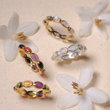 (Rainbow Moonstone/gold) oval horizon CAB eternity ring